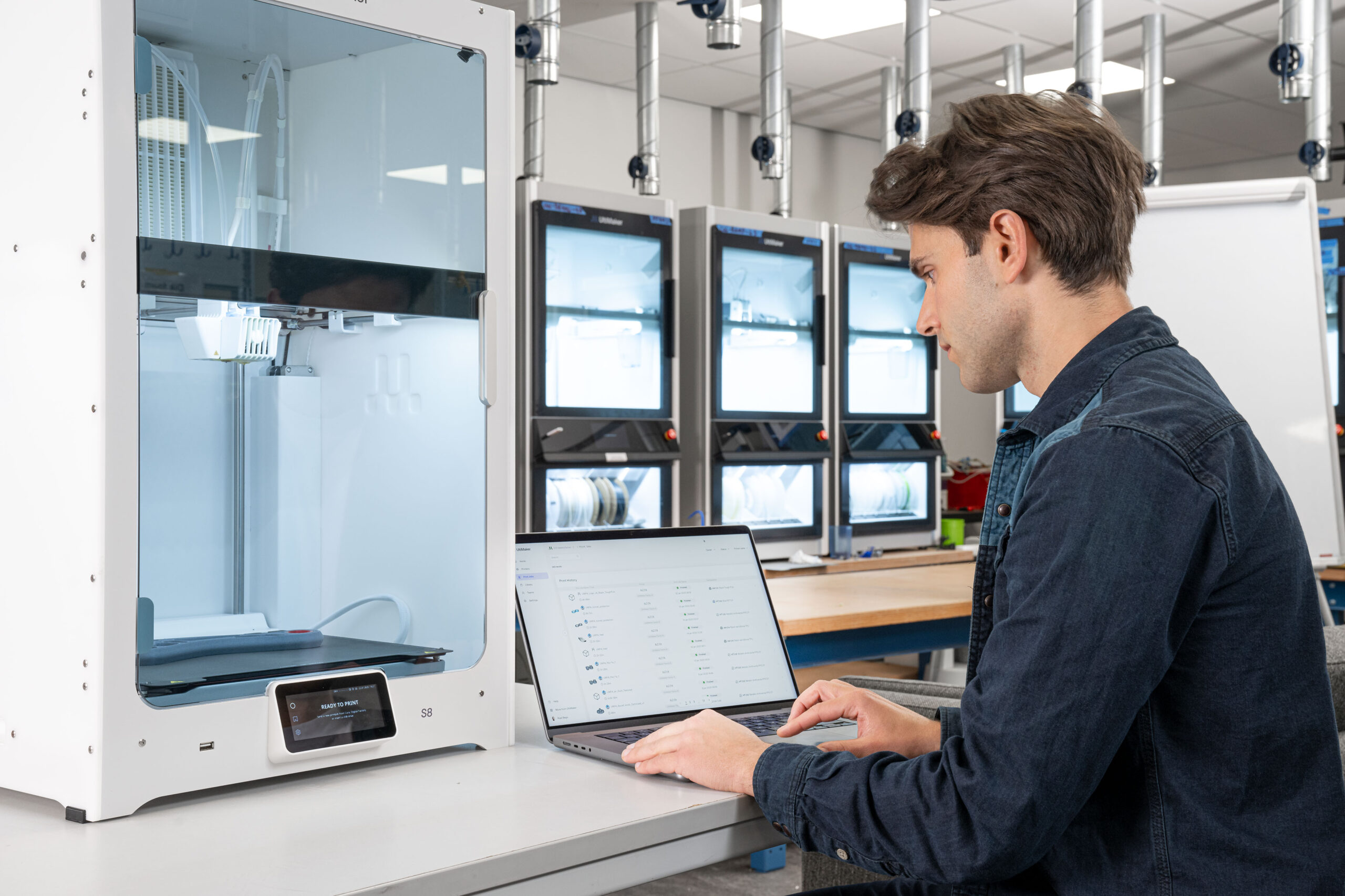 Person working with the new Ultimaker S8 3D Printer