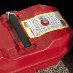 High tack vinyl label printed on Jessup TenaciousTac 1CR applied to a red fuel container