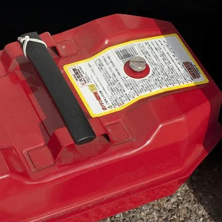 High tack vinyl label printed on Jessup TenaciousTac 1CR applied to a red fuel container