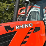 Clear high-tack vinyl graphic printed on Jessup TenaciousTac CLR 1CRAE applied to a red RHINO tractor door
