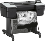 Right angled view of HP DesignJet Z9+ 24 inch printer producing a black and white lion photograph
